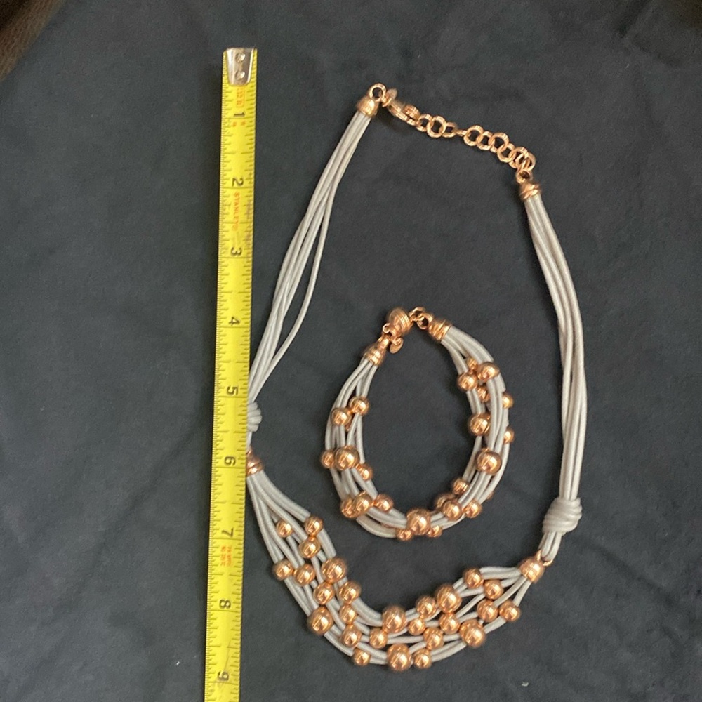 Gray leather set with rose tone beads